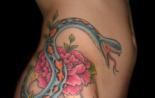 Slangetatovering og betydningen av deres Anaconda-tatovering