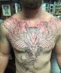 Griffinova tetovaža za muškarce: mitsko i moderno značenje